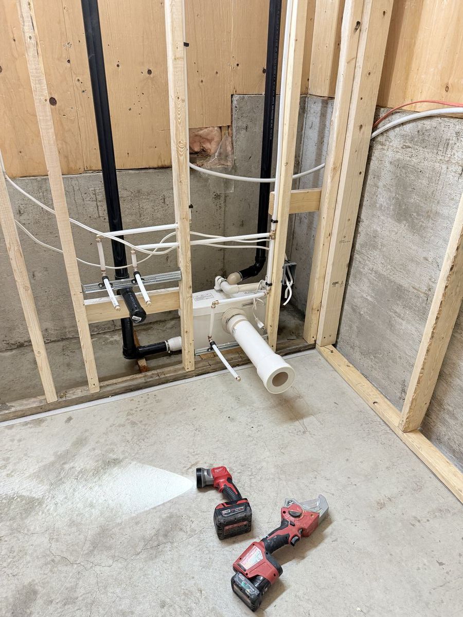 Drain rough-in through floor joists